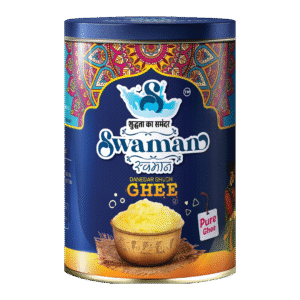 Swaman cow ghee 1 kg container with golden pure ghee inside.