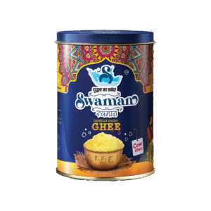 Swaman cow ghee 1-liter container with golden pure ghee inside.
