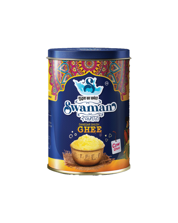Swaman cow ghee 1-liter container with golden pure ghee inside.